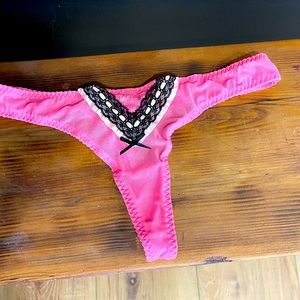 Victoria’s Secret sheer thong panty. Black lace on front. Size M. Beautiful